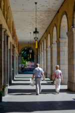 Elderly couple strolling around the city